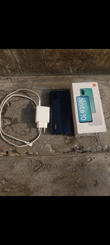 Redmi note 10 with adapter and box condition 10/9 6