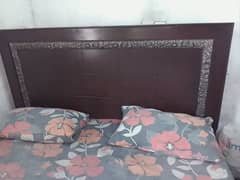 king size bed with mattress and 2 side table