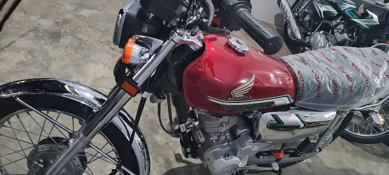 New 125 self-start red color 1