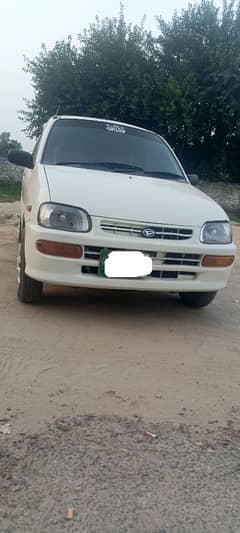 Daihatsu Cuore 2004 fresh look car