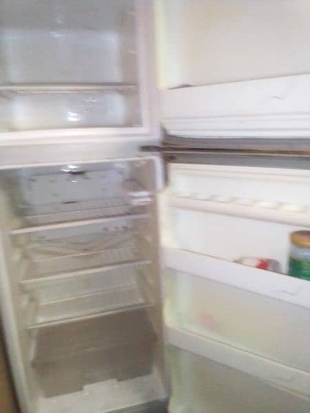 medium size fridge new condition 1