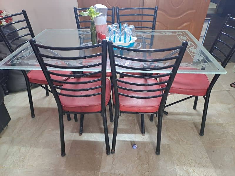 Iron Dining Table with 6 chairs. 2