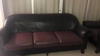 Brown and black sofa set available