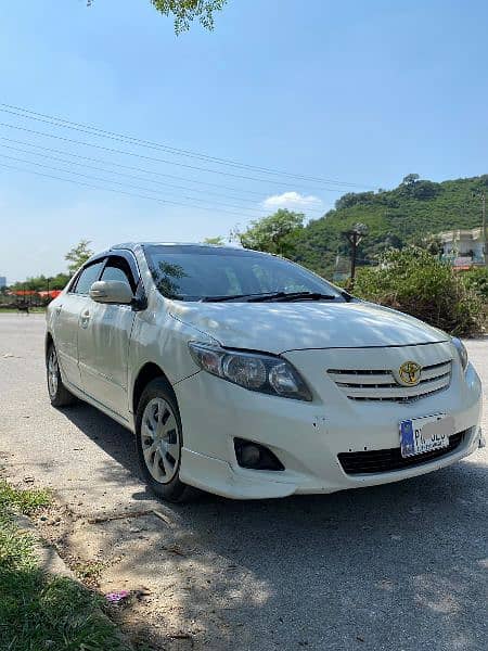 Toyota Corolla 2009 Xli convert Gli Islamabad number 03225322487 1