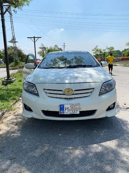 Toyota Corolla 2009 Xli convert Gli Islamabad number 03225322487 2