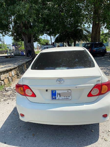 Toyota Corolla 2009 Xli convert Gli Islamabad number 03225322487 3