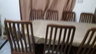 dinnig table of 10 chairs