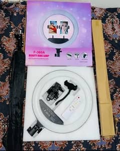 urgent sale tripod and ring light 360