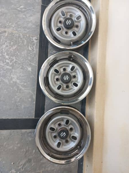 12" Rims  Good Condition. Genvaion. 1