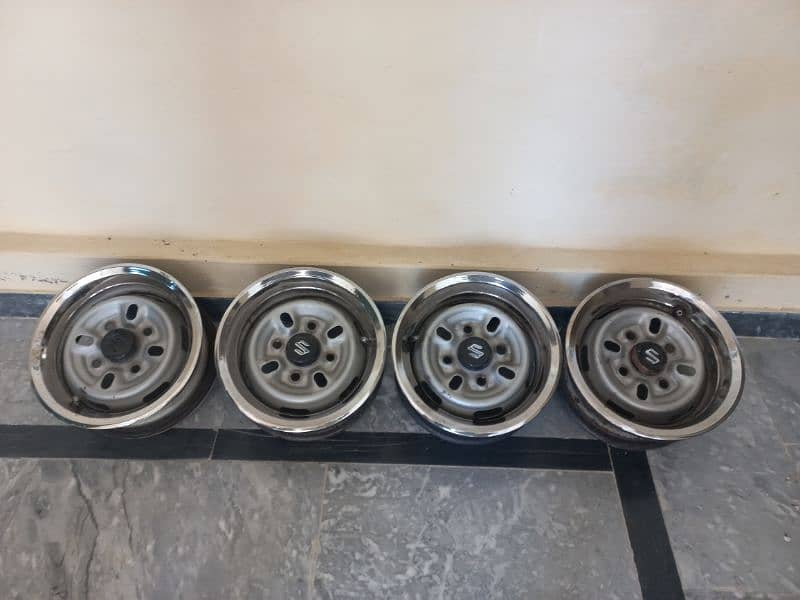 12" Rims  Good Condition. Genvaion. 2