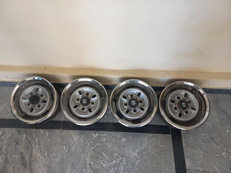 12" Rims  Good Condition. Genvaion. 3