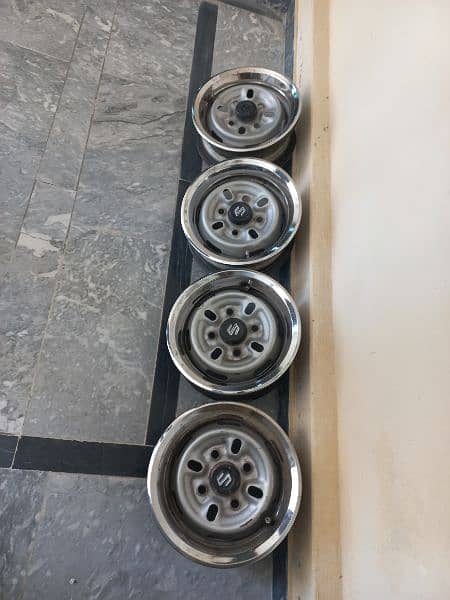 12" Rims  Good Condition. Genvaion. 4