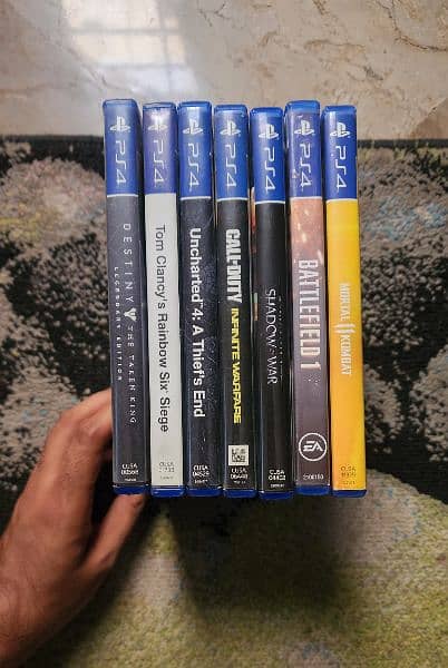 7 PS4 Games and 2 controllers 1