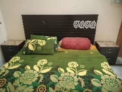 Double bed with two side tables