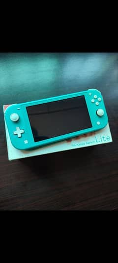 Nintendo Switch Lite (complete box + 2 Games)