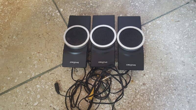 three Creative speakers for use with woofer 3