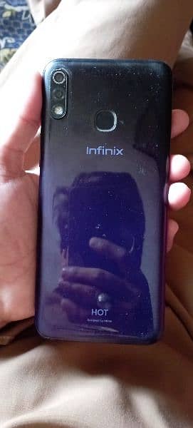 infinix hot 8 lite. . . . 2/32. . . condition rough. . . only mobile 4