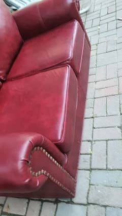 SEMI LEATHER 2 SEATER SOFA UP FOR SALE