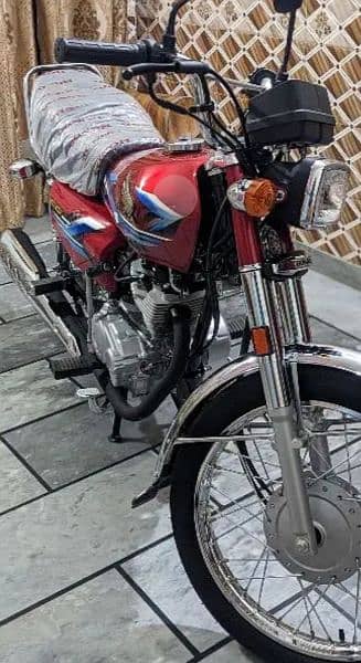 Honda 125 num lga hai 1