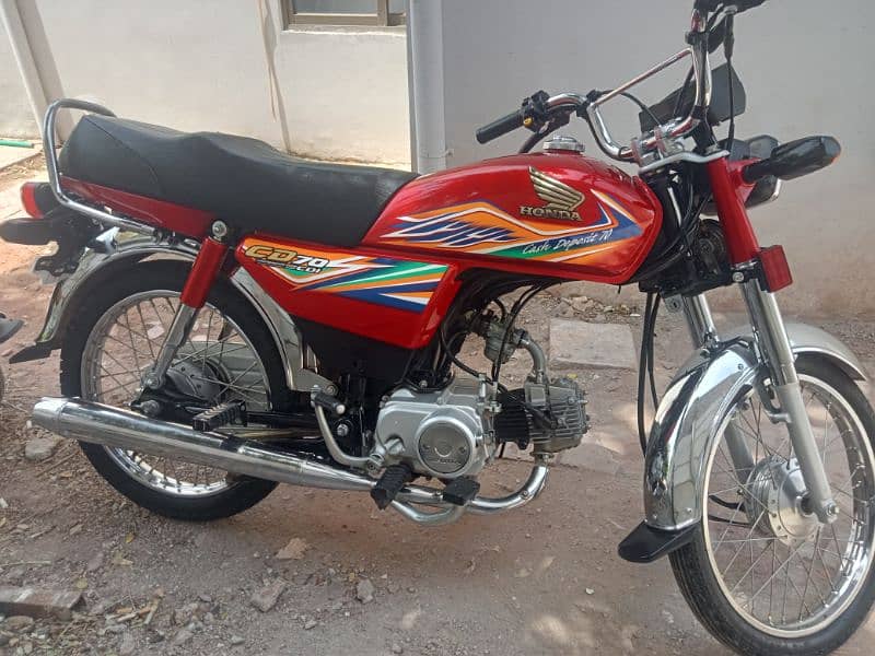 Honda c d 70 rabta nmbr 0,3,1,1,5,6,0,0,5,6,2 4