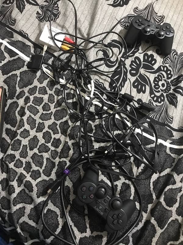 ps2 with 8mb memory card 2 controllers 9