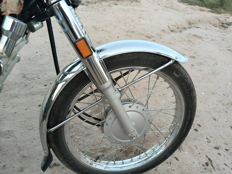 honda 125 one hend bicke 7