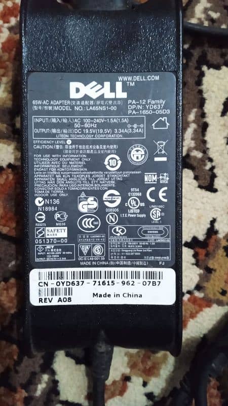 Dell laptop adapter model no LA65NS 1-00 2