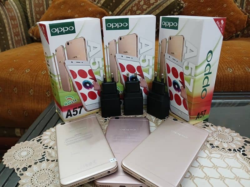 OPPO A57 WITH BOX AND CHARGER. PTA LIFETIME. 4/64.10/10 NEW condition 1