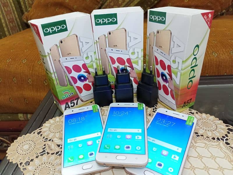 OPPO A57 WITH BOX AND CHARGER. PTA LIFETIME. 4/64.10/10 NEW condition 6