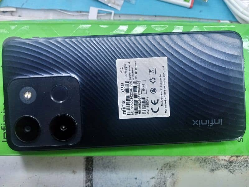 Infinix smart 7 with box and charger 0