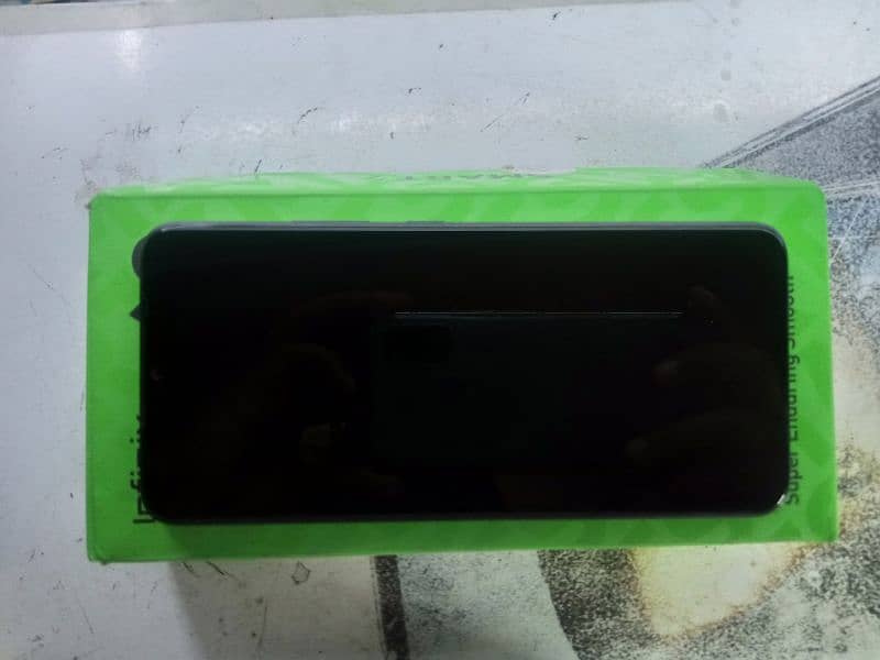 Infinix smart 7 with box and charger 1