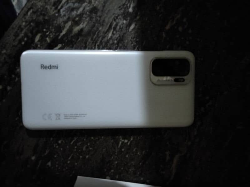 REDMI NOTE 10 white 4 128 Amoled Disply Full box 5