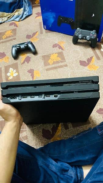 PlayStation 4 Pro 1TB (Jailbreak) with 7 Games, 2 Controllers 8