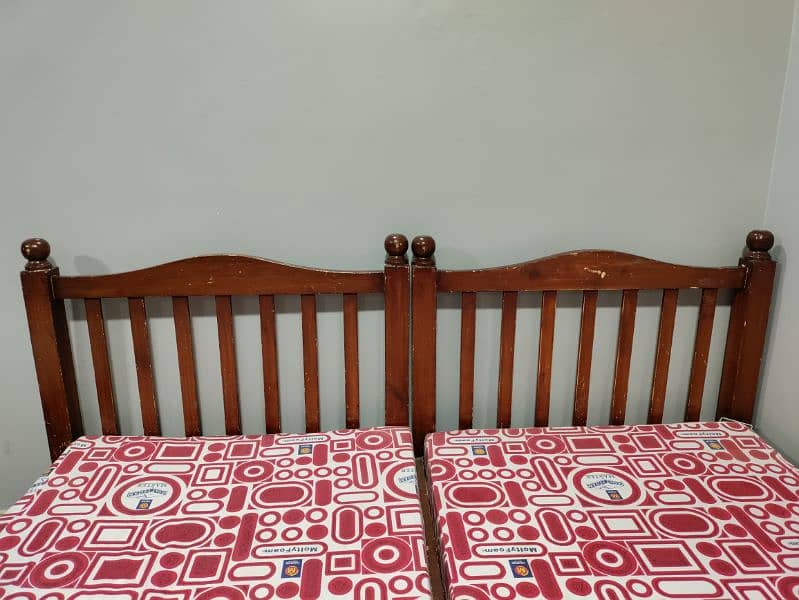 wooden 2 single bed with mattress 3