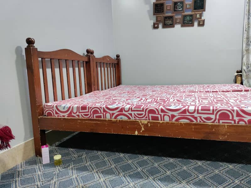 wooden 2 single bed with mattress 4