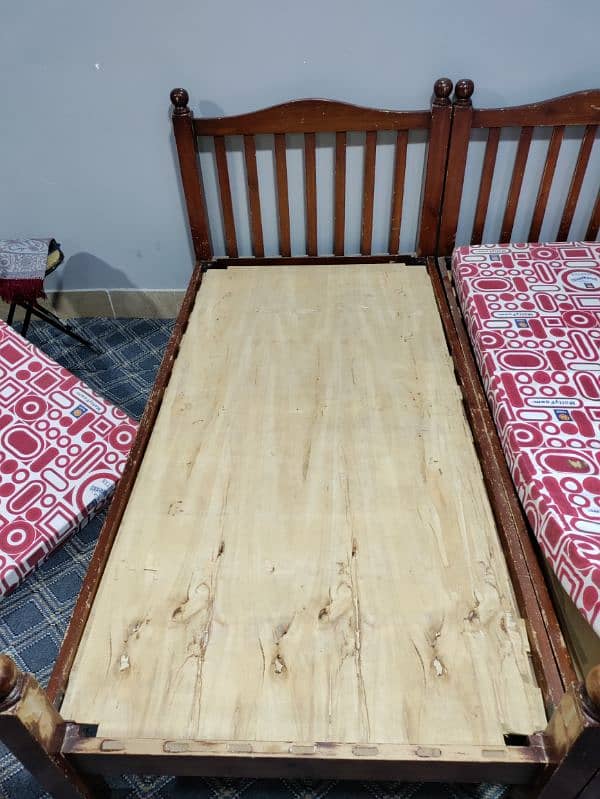 wooden 2 single bed with mattress 10