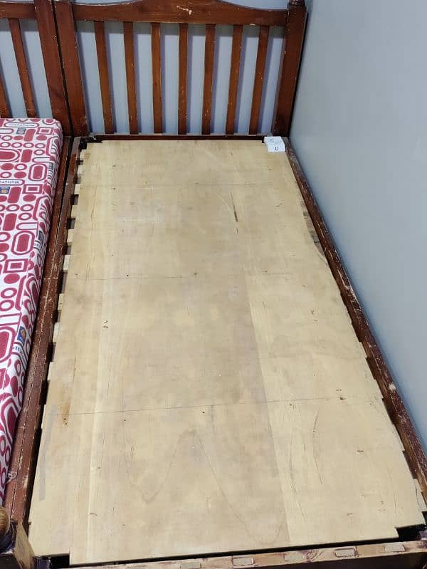 wooden 2 single bed with mattress 11