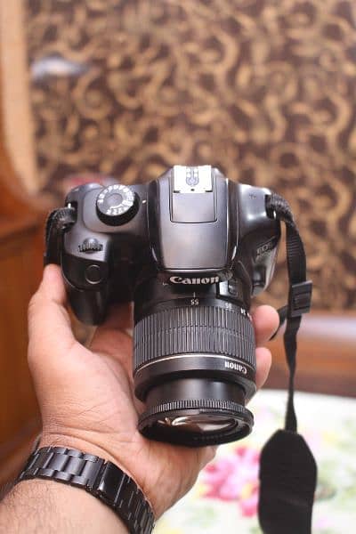 Canon 4000d with 18 55mm lens / WiFi model. 4