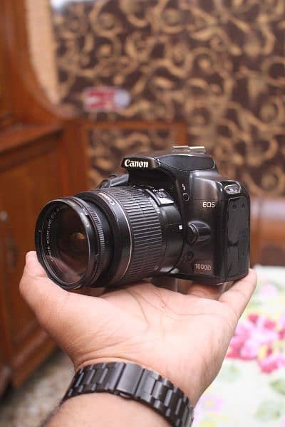 Canon 1000d with 18 55mm lens 0