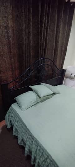 Iron bed with mattress