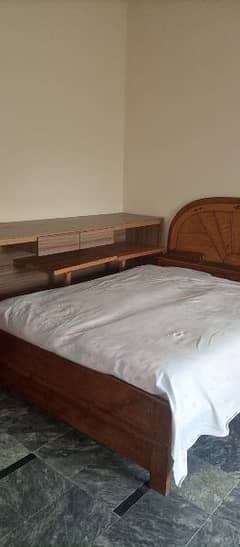 wooden double bed