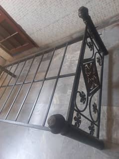 Two single Iron Beds