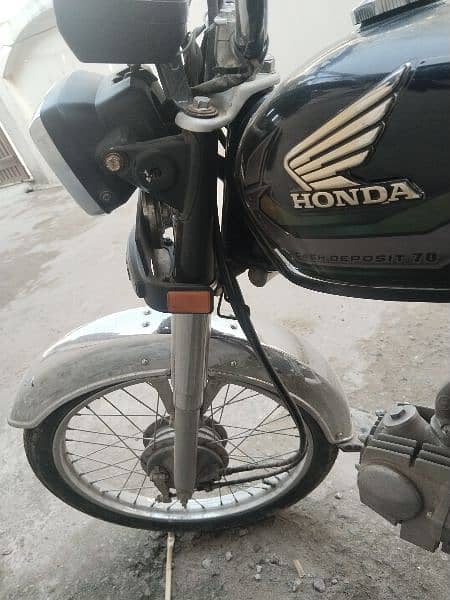 Honda 70cc 22 model sticker 23 ka hai 5