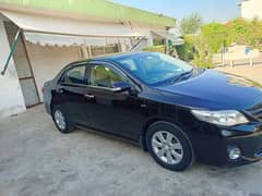 Toyota Corolla GLI 2014 urgent sale 03225129372