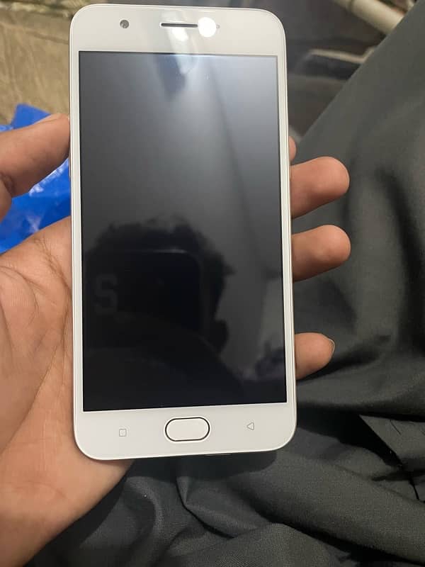 oppo a57. vivo y 27 1