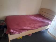 single bed wooden with mattress