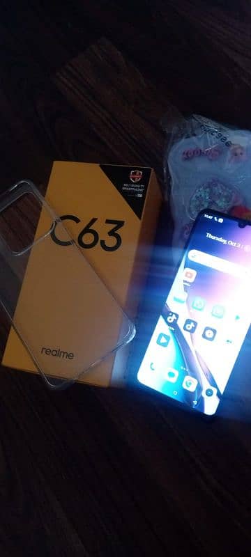 realme c63 arjunt sel 6.128 5