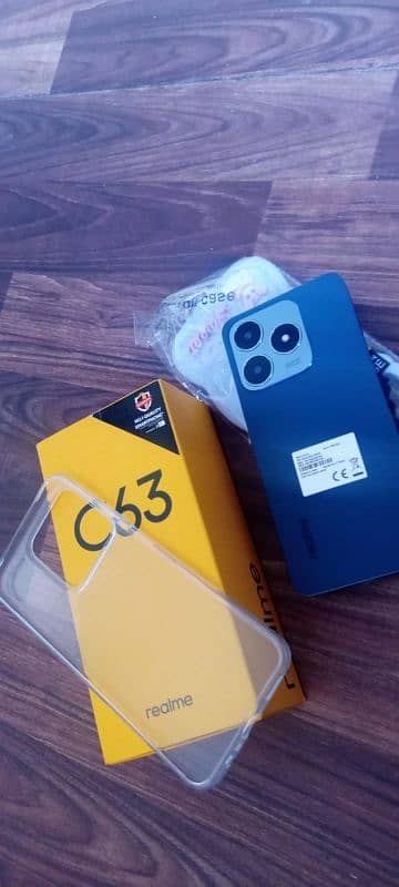 realme c63 arjunt sel 6.128 7