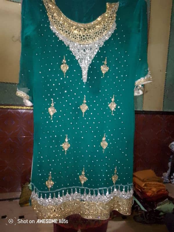 Birdal Green Hand work Drees One Time Used 10 by 10 condition 1