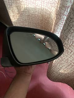 Vitz side mirror up model